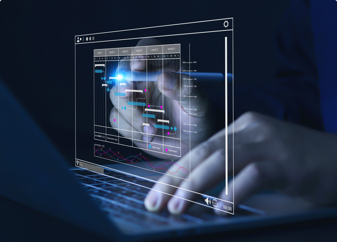 Image of a person typing on a laptop with their left hand and editing using a stylus in their right hand