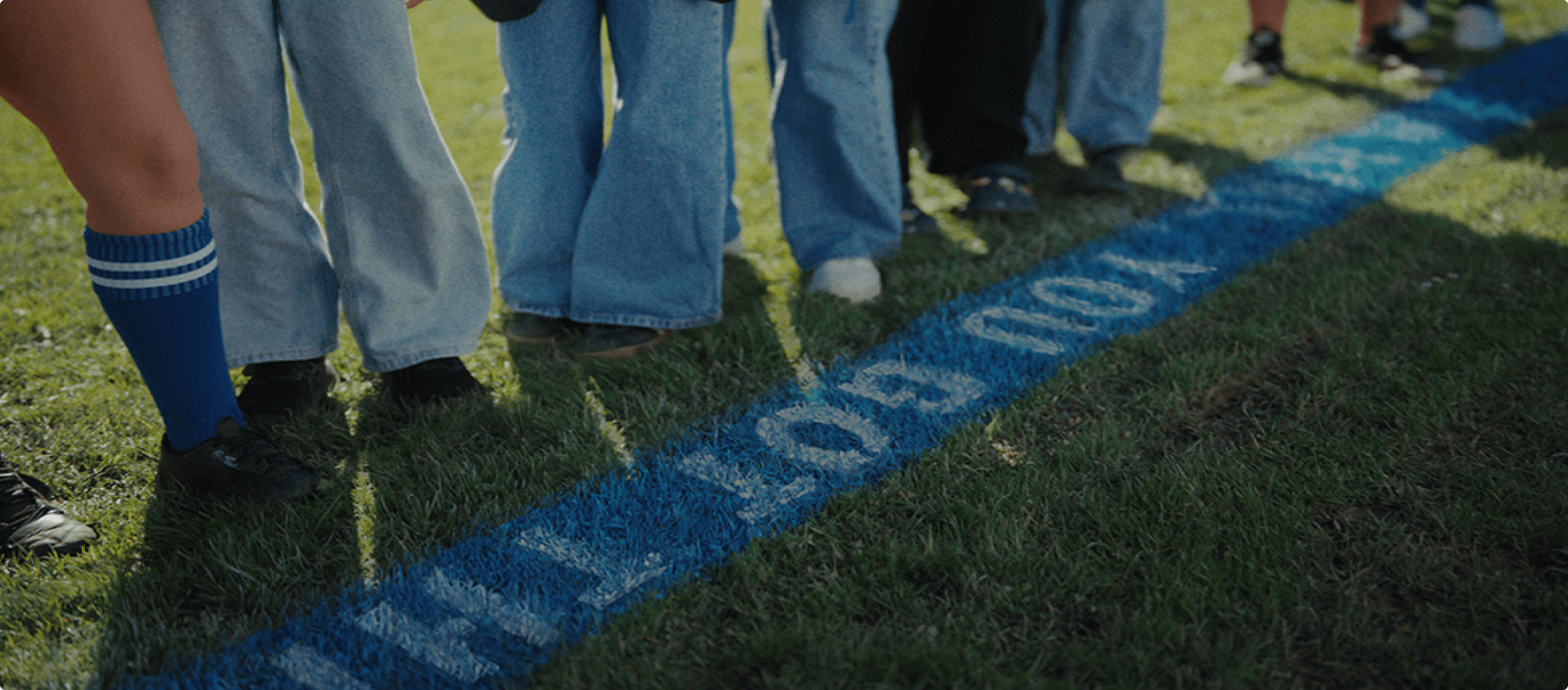 Photo of a blue sideline on a field with the words saying "You got this"