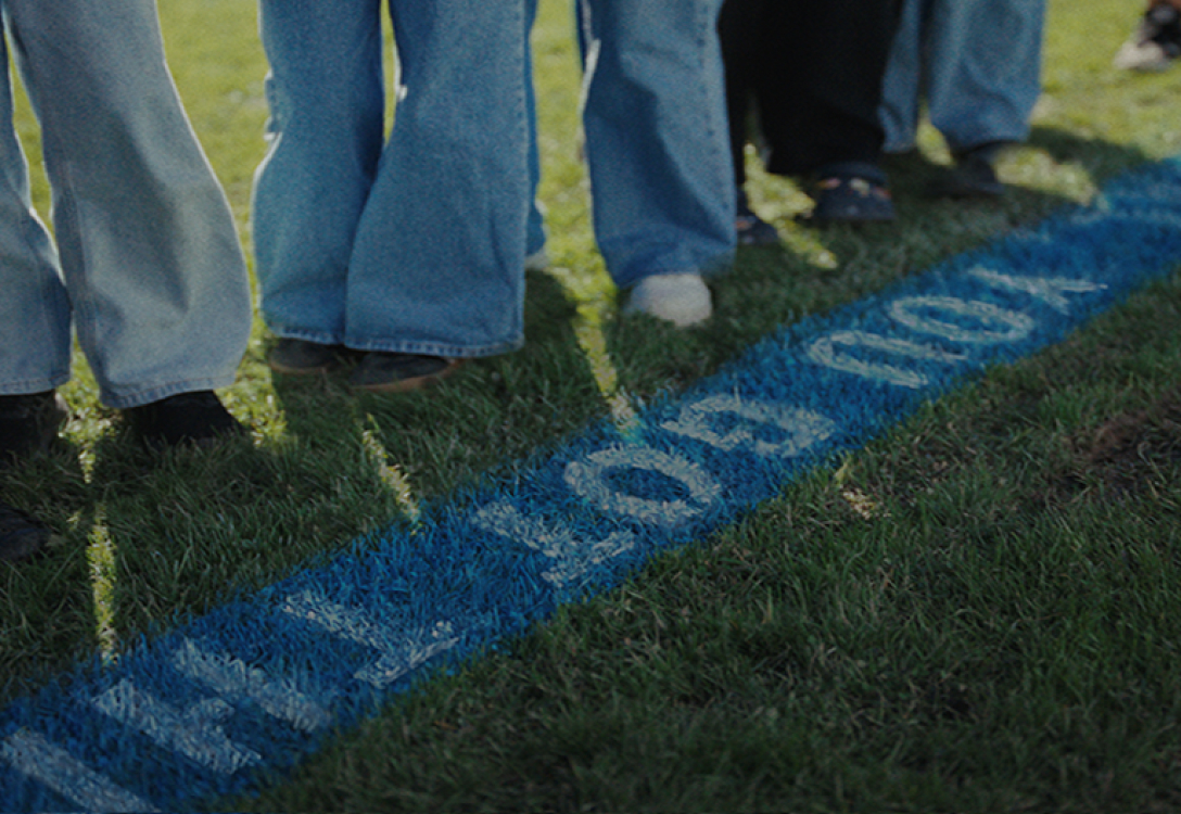 Photo of a blue sideline on a field with the words saying "You got this"