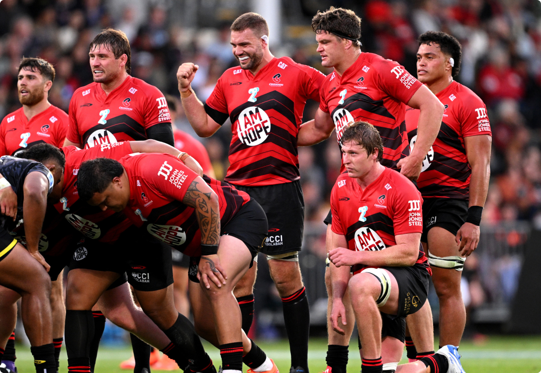 Photo of the Crusaders rugby team about to enter a scrum