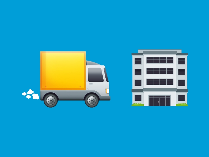 image showing moving truck and office building emoji
