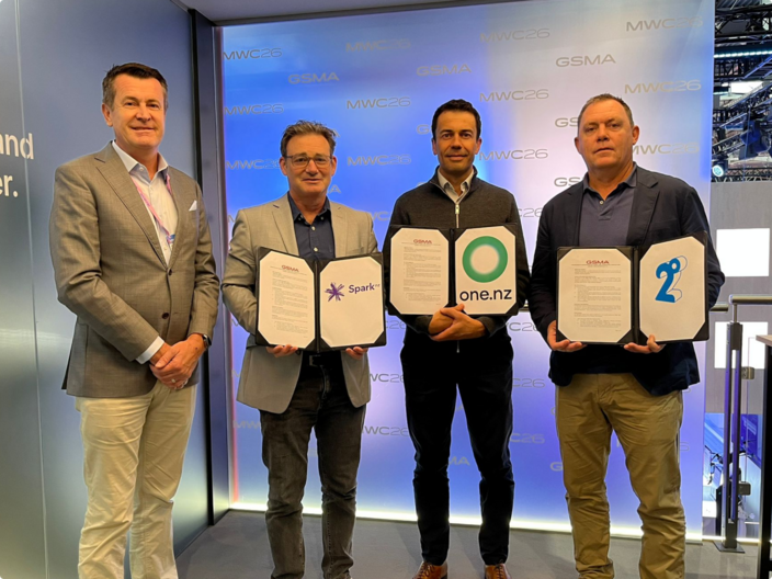 Photo of representatives of Spark, One NZ and the CEO of 2degrees