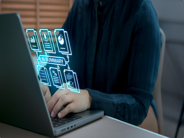 Person typing on a laptop with an image overlayed saying AI summary